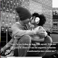 a woman kissing her child with headphones on